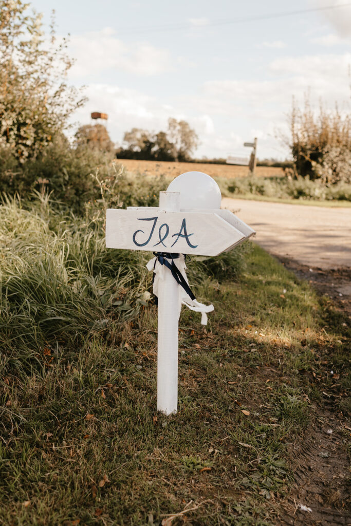 Personalised wedding sign with the couples initials at a private marquee wedding