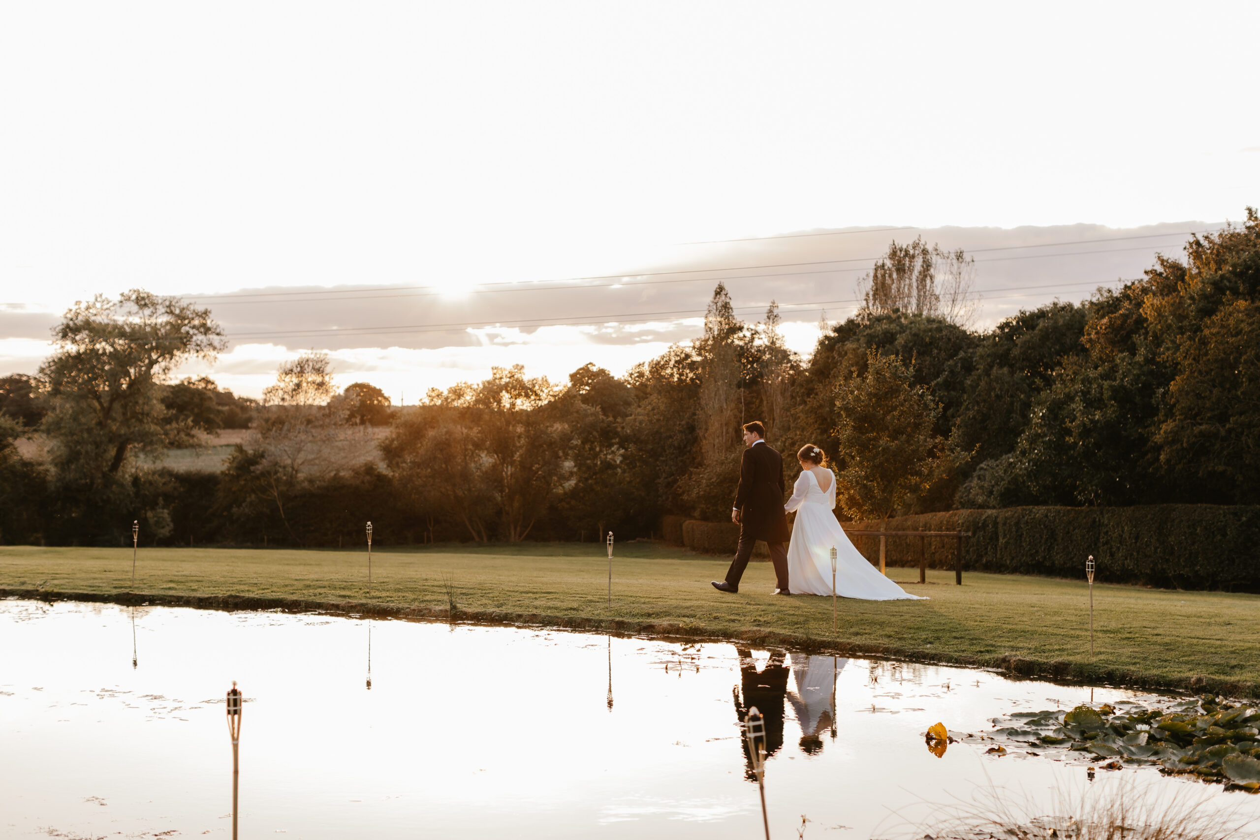 bride groom across pond
